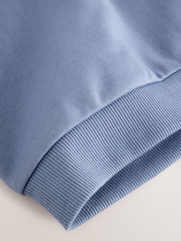 Set Next en bleu