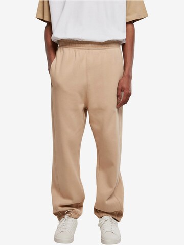 Tapered Pantaloni di Urban Classics in beige: frontale