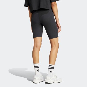 Skinny Leggings 'ESS' di ADIDAS ORIGINALS in nero