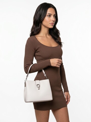 Cluty Crossbody Bag in White: front
