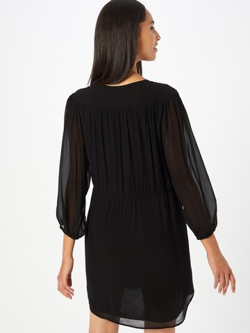 Rochie de la COMMA pe negru