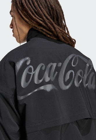 Veste mi-saison 'Coca Cola Teamgeist 26' ADIDAS ORIGINALS en noir