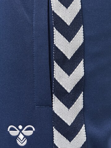 Effilé Pantalon de sport 'Kick' Hummel en bleu