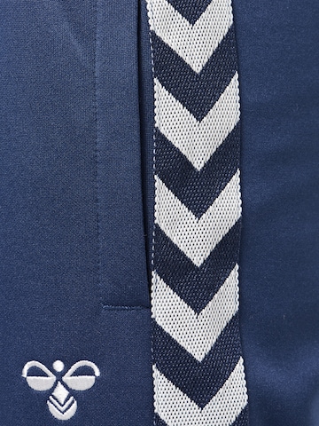 Effilé Pantalon de sport 'Kick' Hummel en bleu