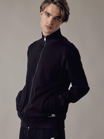 Veste de survêtement 'Felpa' OWN Off With Nature en noir