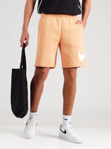 Nike Sportswear Свободный крой Штаны 'Club' в Оранжевый: спереди