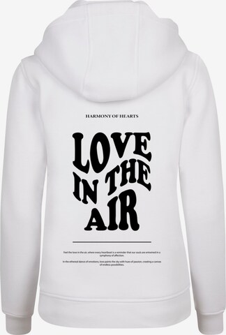 Sweat-shirt 'Love In The Air' Merchcode en blanc