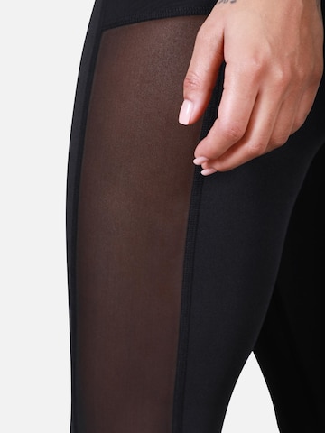 MOROTAI Skinny Sportbroek 'Frame' in Zwart