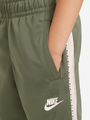 Nike Sportswear Regular Trousers 'Repeat' in Green