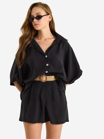 Pantalons de tailleur Bianco Lucci en noir