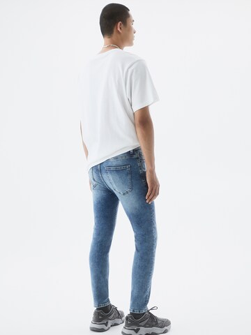 Pull&Bear Tapered Jeans i blå