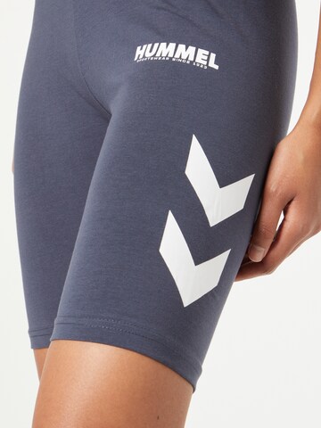 Hummel Skinny Spodnie sportowe 'Legacy' w kolorze niebieski