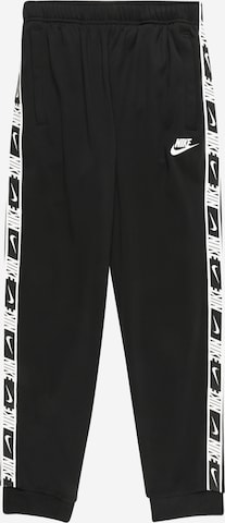 Nike Sportswear Trousers in Black: front