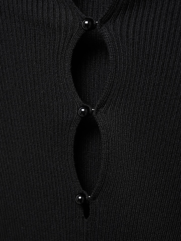 Rochie tricotat de la MANGO pe negru