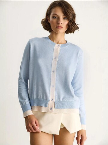 Cardigan Bianco Lucci en bleu