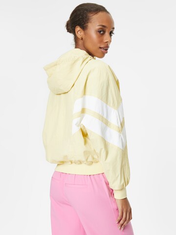 Urban Classics Between-Season Jacket 'Crinkle Batwing' in Yellow