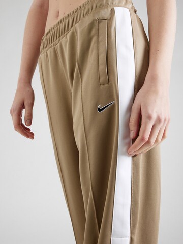 Wide leg Pantaloni de la Nike Sportswear pe verde