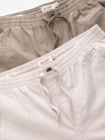 regular Pantaloni di Next in grigio