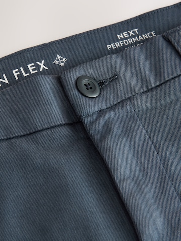 Next Slimfit Chinobyxa i blå