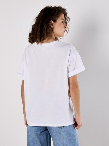 Haut Apricot en blanc