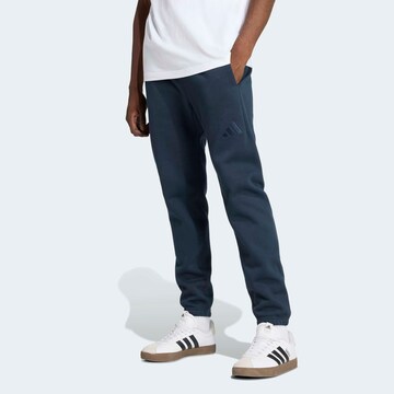 ADIDAS SPORTSWEAR Tapered Workout Pants in Blue: front