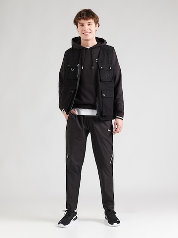 PUMA Majica 'Class' | črna barva