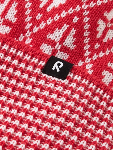 Bonnet 'Kuurassa' Reima en rouge