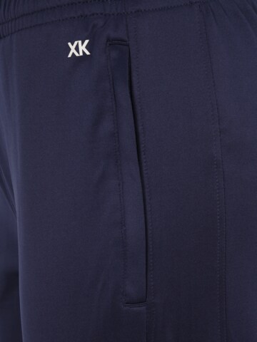 Hummel Slimfit Sportbroek in Blauw