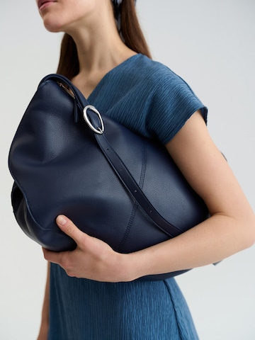 TATUUM - Bolso de mano en azul: frente