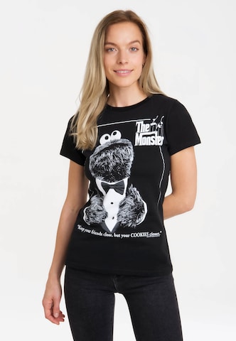 LOGOSHIRT Shirt 'Sesamstrasse - Krümelmonster Pate' in Zwart: voorkant
