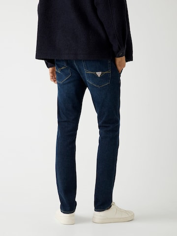 GUESS Skinny Jeans 'Adam' in Blau