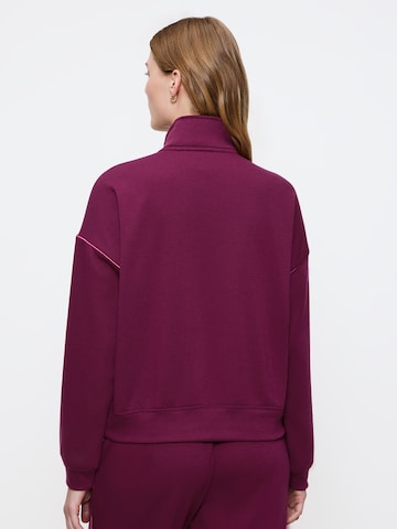 TRIUMPH - Sudadera 'MyWear' en rojo