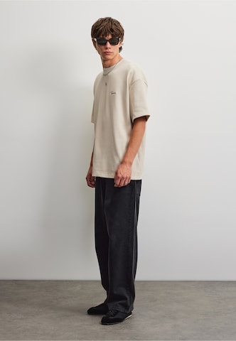 T-Shirt Pegador en beige