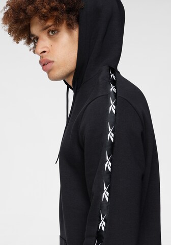 Sweat de sport Reebok en noir