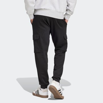 ADIDAS SPORTSWEAR Конический (Tapered) Спортивные штаны 'Essentials' в Черный