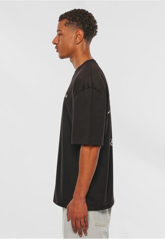 Dropsize T-shirt 'Raised In Heaven' i svart