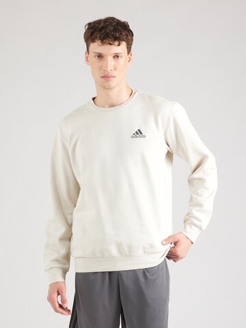 ADIDAS SPORTSWEAR Sports sweatshirt 'FEELCOZY' in Beige: front