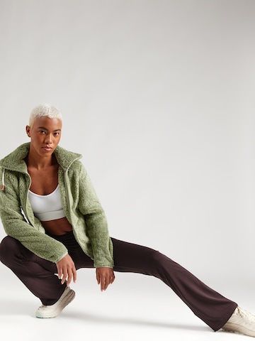 évasé Pantalon de sport 'Float' Girlfriend Collective en marron