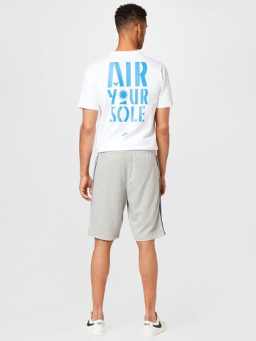 Nike Sportswear - Loosefit Calças em cinzento