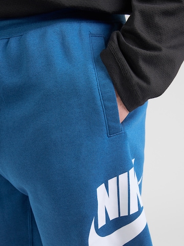 Nike Sportswear Широка кройка Панталон 'CLUB ALUMNI' в синьо