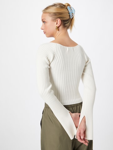 Pull-over Edikted en beige