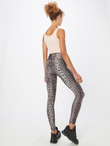 Athlecia Skinny Sportbroek 'Windia' in Bruin