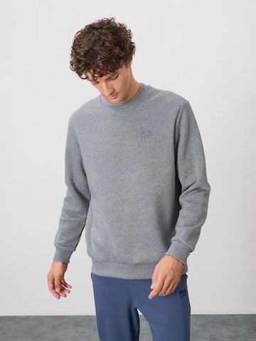 Sweat-shirt Tommy Life en gris