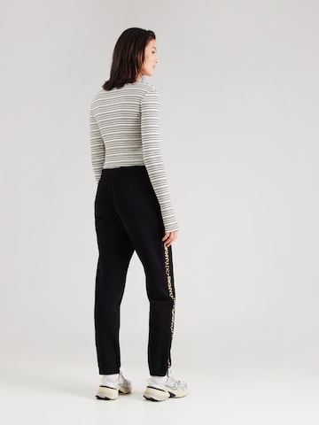 Tapered Pantaloni sportivi di DKNY Performance in nero
