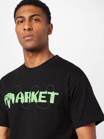 MARKET T-shirt 'Gold Eye' i svart