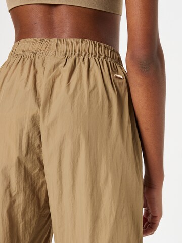 Athlecia Regular Workout Pants 'THARBIA' in Brown