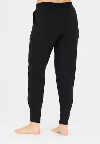 Athlecia Regular Sports trousers in Black