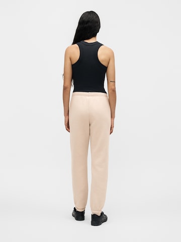 Tapered Pantaloni de la Nike Sportswear pe bej