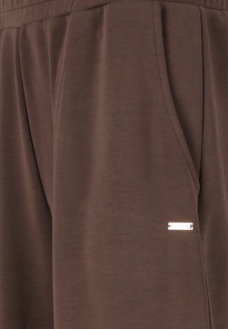 Athlecia Tapered Sportbroek 'Jillnana V2' in Bruin