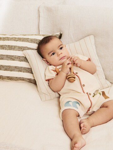 Tutina / body per bambino di Next in beige